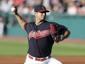 Cleveland Indians starting pitcher Carlos Carrasco delivers in the first inning of a baseball game against the Oakland Athletics, Friday, July 6, 2018, in Cleveland.