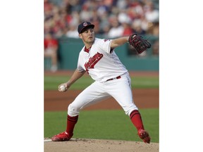 Cleveland Indians starting pitcher Trevor Bauer delivers in the first inning of the team's baseball game against the Cincinnati Reds, Tuesday, July 10, 2018, in Cleveland.