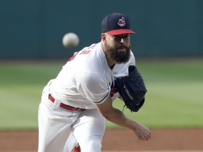 Cleveland Indians starting pitcher Corey Kluber delivers in the first inning of the team's baseball game against the New York Yankees, Thursday, July 12, 2018, in Cleveland.