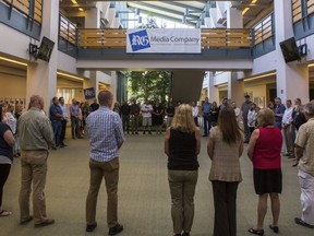 Register Guard employees in Eugene, Ore., join newsrooms nationally in a moment of silence, Thursday July 5, 2018, for the five employees of the Capital Gazette, a Maryland newspaper, who were killed a week ago in one of the deadliest attacks on journalists in U.S. history.