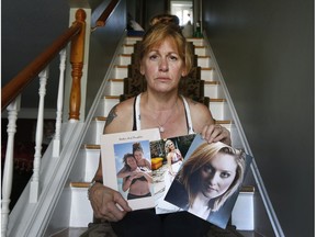 Roxsanna Mueller holds photos of her daughter, Lilly.