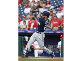 San Diego Padres' Carlos Asuaje watches his RBI double during the first inning of a baseball game against the Philadelphia Phillies, Friday, July 20, 2018, in Philadelphia.