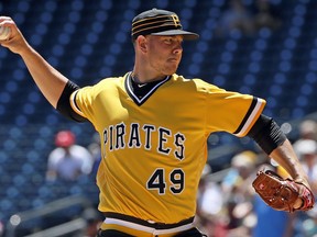 Pittsburgh Pirates starting pitcher Nick Kingham delivers in the first inning of a baseball game against the Philadelphia Phillies in Pittsburgh, Sunday, July 8, 2018.