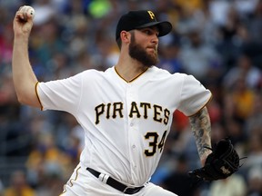 Pittsburgh Pirates starting pitcher Trevor Williams delivers in the first inning of the team's baseball game against the New York Mets in Pittsburgh, Saturday, July 28, 2018.