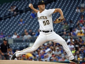 Pittsburgh Pirates starting pitcher Jameson Taillon delivers during the first inning of the team's baseball game against the Chicago Cubs in Pittsburgh, Tuesday, July 31, 2018.