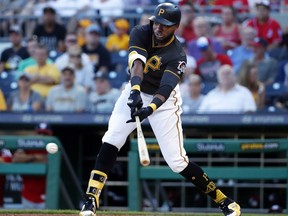 Pittsburgh Pirates' Gregory Polanco drives in two runs with a single off Washington Nationals starting pitcher Jefry Rodriguez in the first inning of a baseball game in Pittsburgh, Monday, July 9, 2018.