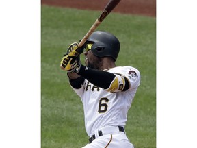 Pittsburgh Pirates' Starling Marte watches his two-run home run off Washington Nationals starting pitcher Gio Gonzalez in the third inning of a baseball game in Pittsburgh, Wednesday, July 11, 2018.