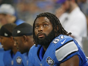 FILE - In this Nov. 26, 2015, file photo, Detroit Lions tight end Brandon Pettigrew (87) watches the scoreboard during the second half of an NFL football game against the Philadelphia Eagles, in Detroit. Pettigrew was arrested in Pittsburgh early Monday, July 9, 2018, for punching an officer in the chest after refusing to pay $97 for a limo ride to a hotel, according to police, who say the NFL free agent and former Lions player has been charged with two counts of aggravated assault, theft of services and public drunkenness.