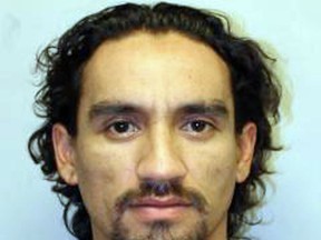 This undated photo provided by the Hawaii Police Department shows Justin Waiki. A police officer on Hawaii's Big Island died after a shooting during a traffic stop Tuesday, July 17, 2018, and a manhunt is underway for suspect Waiki.