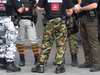 Montreal police officers wearing camouflage pants in 2014 as part of a labour protest.