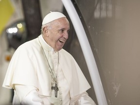 Pope Francis smiles at supporters outside the Vatican Apostolic Nunciature in Santiago, Chile, on Jan. 15, 2018. MUST CREDIT: Bloomberg photo by Tamara Merino