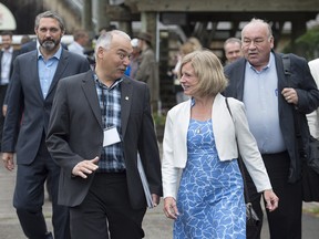 Yukon Premier Sandy Silver, Nunavut Premier Joe Savikataaq, Alberta Premier Rachel Notley and Northwest Territories Premier Bob McLeod, left to right, arrive for a meeting of Canadian premiers and Indigenous leaders at Le Pays de la Sagouine, in Bouctouche, N.B.