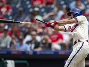 Philadelphia Phillies' Jake Arrieta breaks his bat while hitting a single in the third inning of a baseball game against the Washington Nationals, Sunday, July 1, 2018, in Philadelphia.