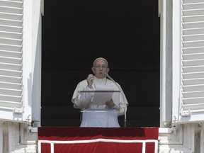 Pope Francis delivers his message during the Angelus noon prayer in St. Peter's Square at the Vatican, Sunday, July 22, 2018.