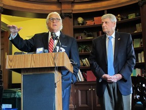 Maryland Senate President Thomas V. Mike Miller, left, and House Speaker Michael Busch discuss an FBI briefing they received about Russian links to a company that maintains part of the state election board's voter registration platform during a news conference in Annapolis, Md. on Friday, July 13, 2018.