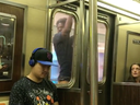 Isaiah Thompson was arrested after being identified as the man clinging to the subway train's doors from the outside. 