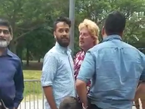 A still from a video that shows Lombray Ball verbally attack a Muslim family.