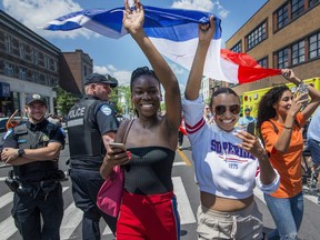 France soccer fans celebrate their team's World Cup victory in Montreal on Sunday, July 15, 2018.