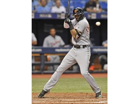 Detroit Tigers' Nicholas Castellanos is hit by a pitch from Tampa Bay Rays reliever Jaime Schultz during the seventh inning of a baseball game Monday, July 9, 2018, in St. Petersburg, Fla.