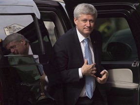 Outgoing Prime Minister Stephen Harper arrives at his office in Ottawa on Oct. 21, 2015.