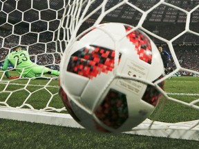 Croatia goalkeeper Danijel Subasic fails to stop France's Antoine Griezmann from scoring from the penalty spot his side's second goal during the final match between France and Croatia at the 2018 soccer World Cup in the Luzhniki Stadium in Moscow, Russia, Sunday, July 15, 2018.