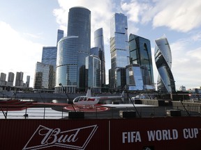 In this July 5, 2018 photo, a helicopter sits atop the Budweiser boat, parked on the Moskva River during the 2018 soccer World Cup in Moscow, Russia.