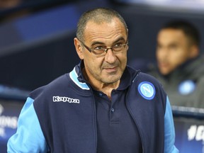 FILE - In this Oct. 17, 2017, file photo, Napoli coach Maurizio Sarri arrives prior to the start of the Champions League group F soccer match between Manchester City and Napoli at the Etihad Stadium in Manchester, England. Chelsea has hired Maurizio Sarri as its manager on a three-year contract. The announcement was made on Saturday, July 14, 2018.