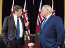 Ontario Premier Doug Ford and Toronto Mayor John Tory meet inside the Premier's office at Queen's Park in Toronto on July 9, 2018.