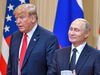 U.S. President Donald Trump and Russian President Vladimir Putin arrive for a joint press conference in Helsinki, Finland, on July 16, 2018.
