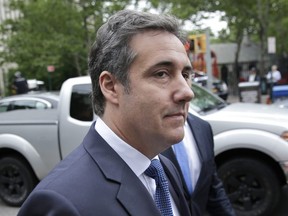 In this May 30, 2018 file photo, attorney Michael Cohen arrives to court in New York. Cohen, President Donald Trump's longtime personal attorney says porn actress Stormy Daniel's lawyer is running a "smear campaign" and insists a federal judge must step in and issue a gag order.