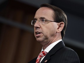 Deputy Attorney General Rod Rosenstein speaks during a news conference at the Department of Justice, Friday, July 13, 2018, in Washington.