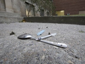 A discarded needle on Bond Street in Toronto on Wednesday, Nov. 15, 2017.