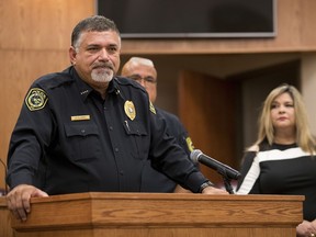 Robstown Chief of Police Erasmo Flores speaks at a news conference, Saturday, July 28, 2018 in Robstown, Texas.  Texas authorities say five people have been killed following separate shootings that included a nursing home in a Corpus Christi suburb. Robstown City Secretary Herman Rodriguez says via Twitter that three people were killed Friday following a shooting at the Retama Manor nursing home. Two additional men were found dead in a home linked to that shooting.