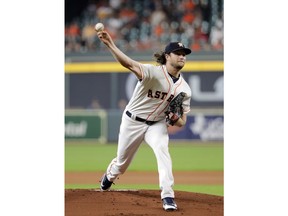 Houston Astros starting pitcher Gerrit Cole throws against the Oakland Athletics during the first inning of a baseball game Monday, July 9, 2018, in Houston.