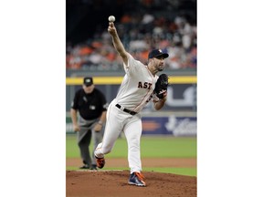 Houston Astros starting pitcher Justin Verlander throws during the first inning of the team's baseball game against the Oakland Athletics on Tuesday, July 10, 2018, in Houston.