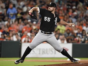 Chicago White Sox starting pitcher Carlos Rodon delivers during the first inning of the team's baseball game against the Houston Astros, Thursday, July 5, 2018, in Houston.
