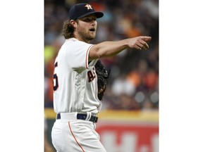 Houston Astros starting pitcher Gerrit Cole argues a call during the first inning of a baseball game against the Detroit Tigers, Saturday, July 14, 2018, in Houston.