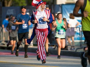 A man dressed as Uncle Sam participates in a race in Atlanta on July 4, 2018.