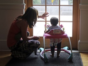 In this May 18, 2018 photo, Vicky Chavez plays with her daughter Issabella within the walls of the First Unitarian Church, in Salt Lake City. Chavez, a Honduran woman who came to the U.S. four years ago seeking asylum from an abusive boyfriend says she'll continue taking sanctuary in a Salt Lake City Unitarian church where she's been for the past six months with her two young daughters despite being ordered to leave and exhausting her appeals. Chavez says seeing fellow Central Americans separated from their children at the U.S.-Mexico border makes her intent on trying to fight to stay in the United States.