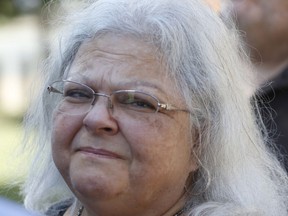 Susan Bro, the mother of Charlottesville car attack victim, Heather Heyer, speaks to reporters outside federal court in Charlottesville, Va., Thursday, July 5, 2018. Bro attended the hearing for James Alex Fields who is charged with hate crimes as a result of the white nationalist rally last year.