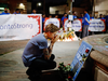 A young man attends a vigil remembering the victims of a shooting on Sunday evening on Danforth, Avenue in Toronto, July 23, 2018.