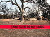 Police tape blocks the house where James Roberts, 5, Emily Roberts, 4, and their grandmother Melody Bledsoe, 70 were found dead following a wildfire in Redding, Calif., July 28, 2018.