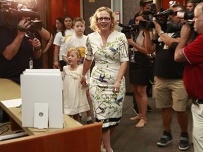 Rep. Kyrsten Sinema, D-Ariz. arrives at the Secretary of State's office to deliver her ballot signatures, Tuesday, May 29, 2018, at the Capitol in Phoenix. Sinema has come a long way from her days as a green party activist as she seeks to become the first Democrat to represent Arizona in the Senate in 30 years.