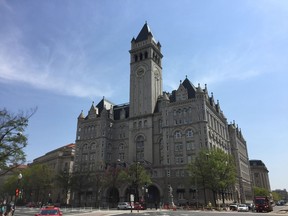 FILe - In this April 13, 2017, photo, shows the Trump International Hotel is on Pennsylvania Avenue in Washington. A federal judge ruled July 25, 2018, that Maryland and the District of Columbia can proceed with their lawsuit accusing President Donald Trump of unconstitutionally accepting payments from foreign and state interests through his Washington hotel. The decision clears the way for the plaintiffs to seek financial records and other materials from the president's company.