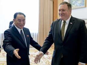 In this July 7, 2018, file photo, U.S. Secretary of State Mike Pompeo, right, and Kim Yong Chol, a North Korean senior ruling party official and former intelligence chief, arrive for a lunch at the Park Hwa Guest House in Pyongyang, North Korea.