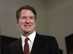 In this July 26, 2018, photo, Supreme Court nominee Judge Brett Kavanaugh meets with Sen. Jim Inhofe, R-Okla., on Capitol Hill in Washington. More than a decade after he served as what's been called the president's "inbox and outbox," Kavanaugh's role as White House staff secretary to President George W. Bush has become a flashpoint as Republicans push his confirmation to the Supreme Court.