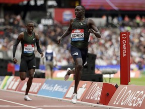 Emmanuel Kipkurui Korir of Kenya crosses the finish line to win the men's 800 meters race at the IAAF Diamond League athletics meeting at London Stadium in London, Sunday, July 22, 2018.
