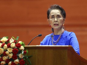 Myanmar's leader Aung San Suu Kyi speaks during the opening ceremony of the  third session of the 21st Century Panglong Conference at the Myanmar International Convention Centre in Naypyitaw, Myanmar, Wednesday, July 11, 2018. Suu Kyi and the country's military commander have opened the major conference with representatives of ethnic minority groups to try to reach a lasting peace after seven decades of strained relations and armed conflict.