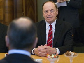 Russian Foreign Minister Sergey Lavrov, back to a camera, listens to U.S. Sen. Richard Shelby, R-Ala., right, during his meeting with U.S. congressional delegation in Moscow, Russia, Tuesday, July 3, 2018. The U.S. congressional delegation is scheduled to meet with senior Russian officials amid preparations for a summit between the nations' presidents.