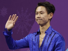 FILE - In this Feb. 16, 2018 file photo, figure skater Denis Ten, of Kazakhstan, reacts as his score is posted following his performance in the men's short program figure skating, in the Gangneung Ice Arena at the 2018 Winter Olympics in Gangneung, South Korea. Prosecutors in Kazakhstan said Thursday, July 19, 2018, that Olympic figure skating medalist Denis Ten has been killed, and they are treating the case as murder.